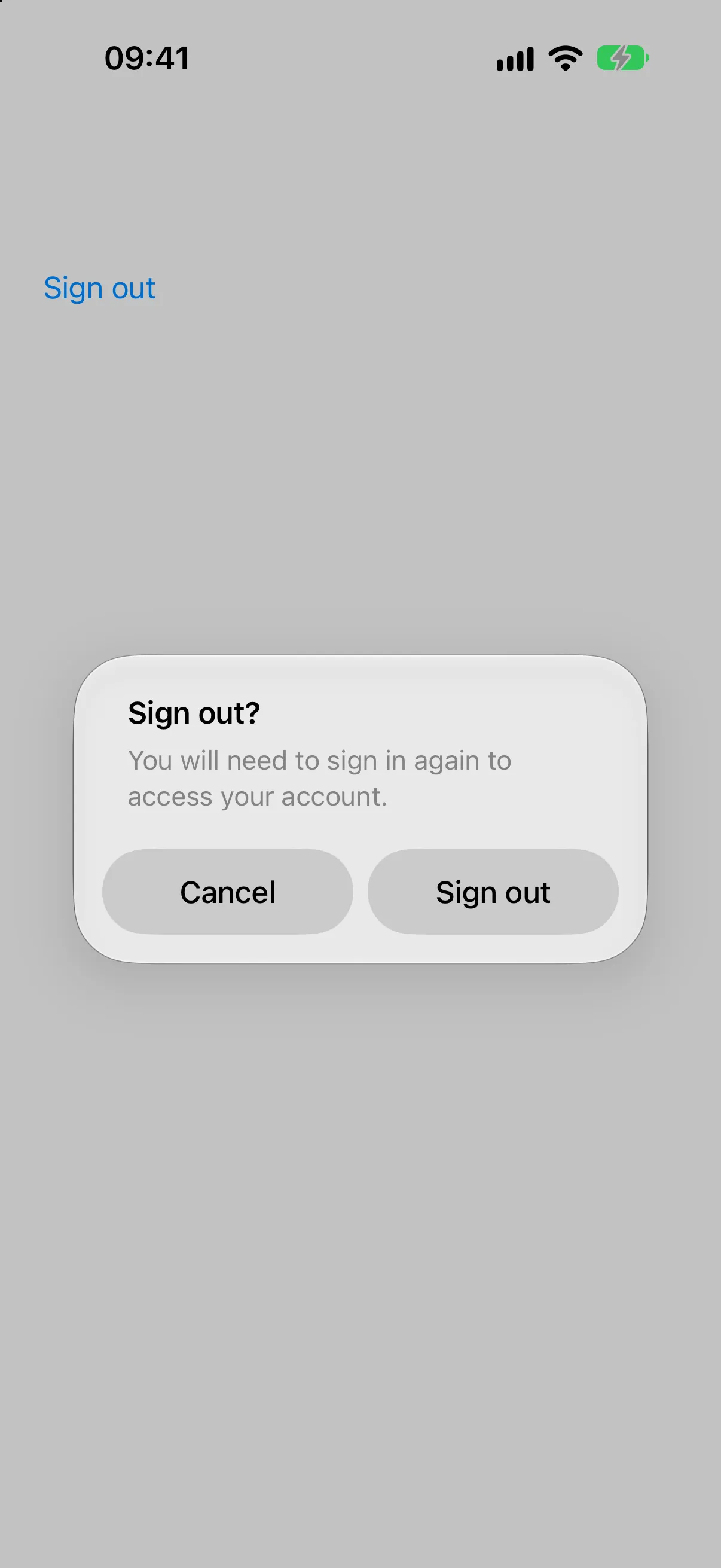 Alert titled Sign out? with a message and Cancel and Sign out buttons