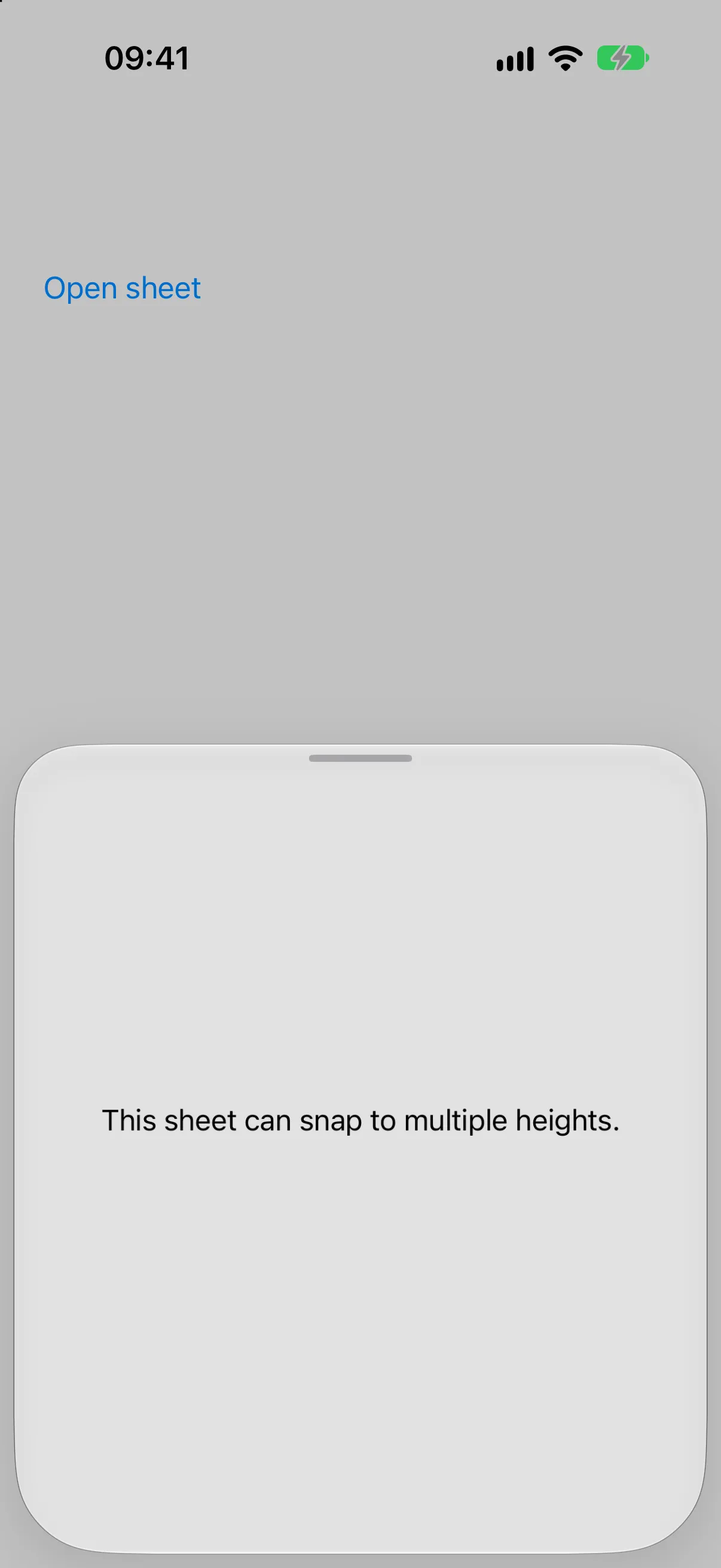 A bottom sheet at the medium detent showing text about snapping to multiple heights
