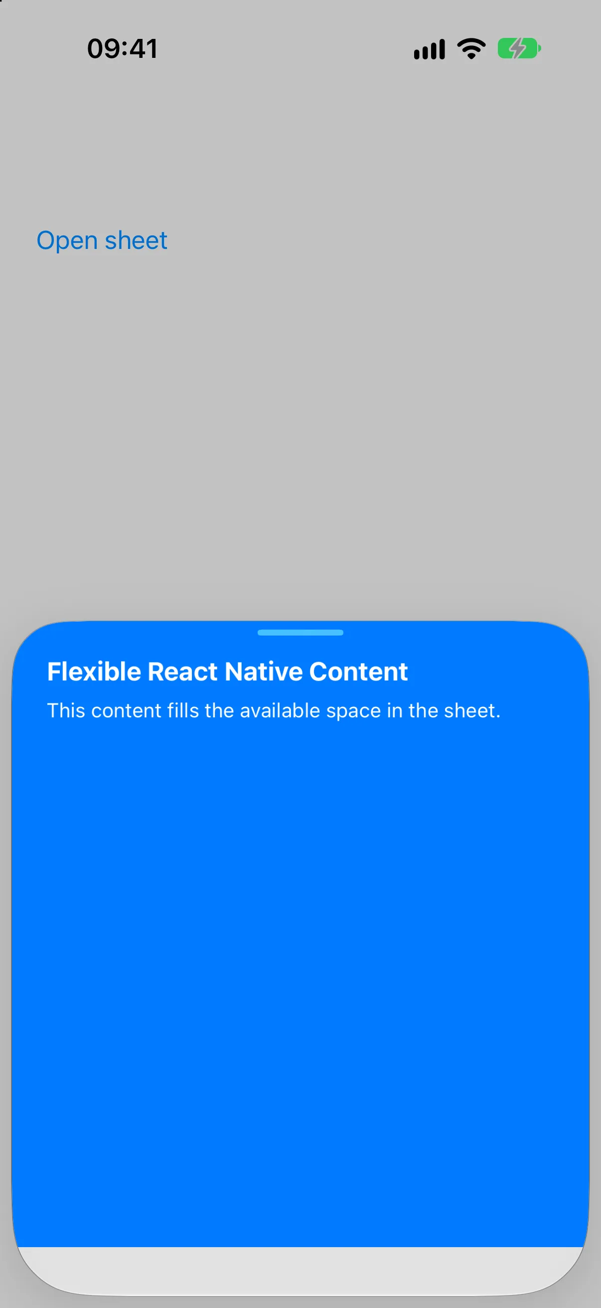 A bottom sheet filled by a blue React Native view at the medium detent