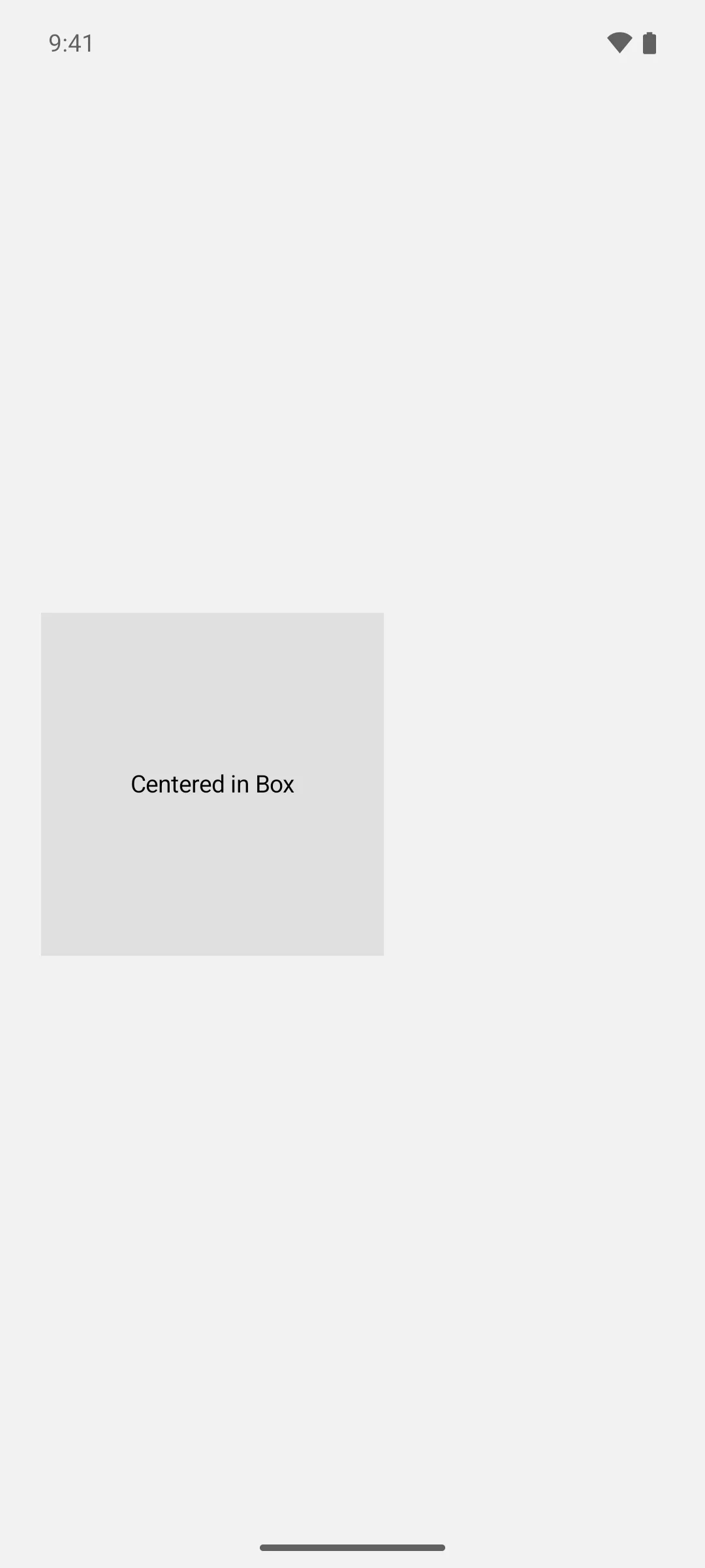 A 200 by 200 light grey square with the text Centered in Box in its middle