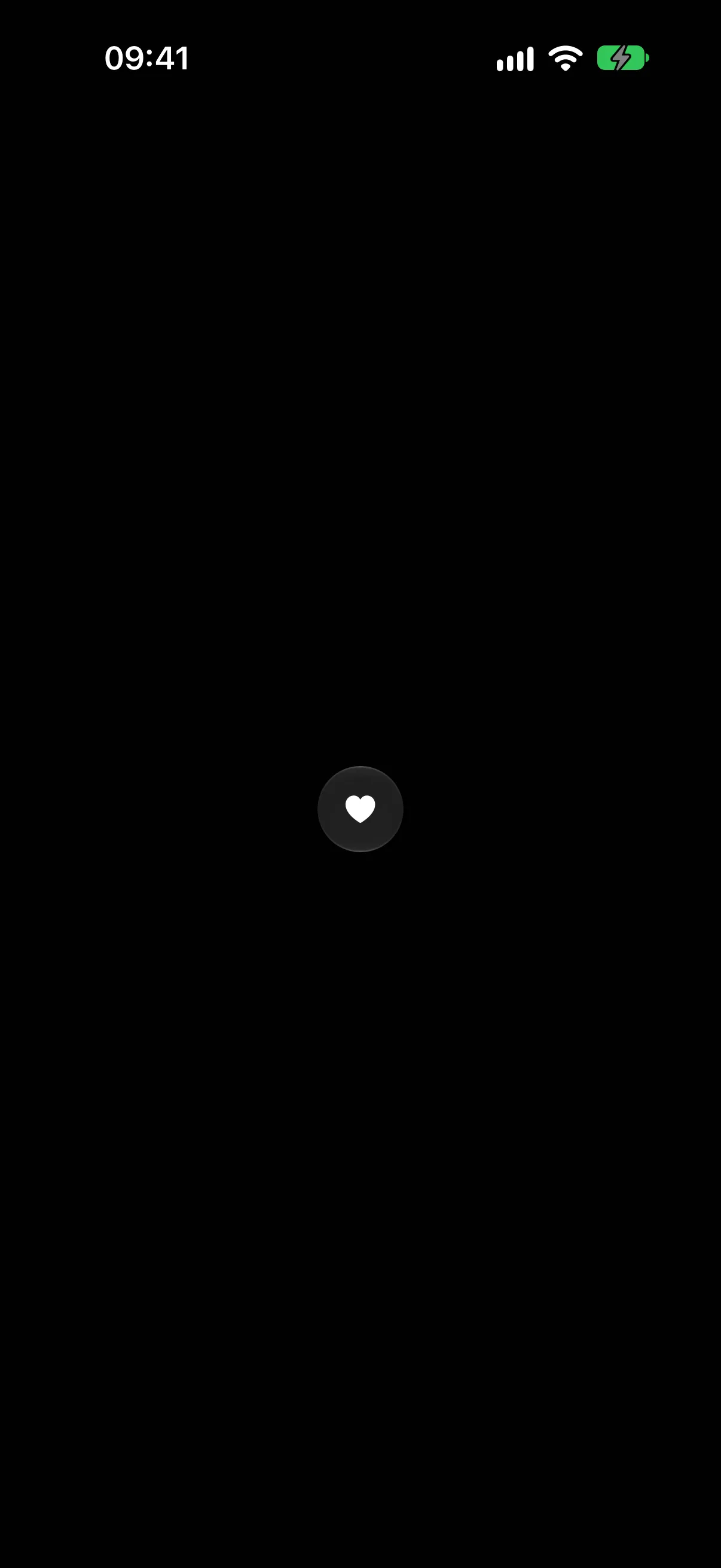 A circular glass button holding a heart icon