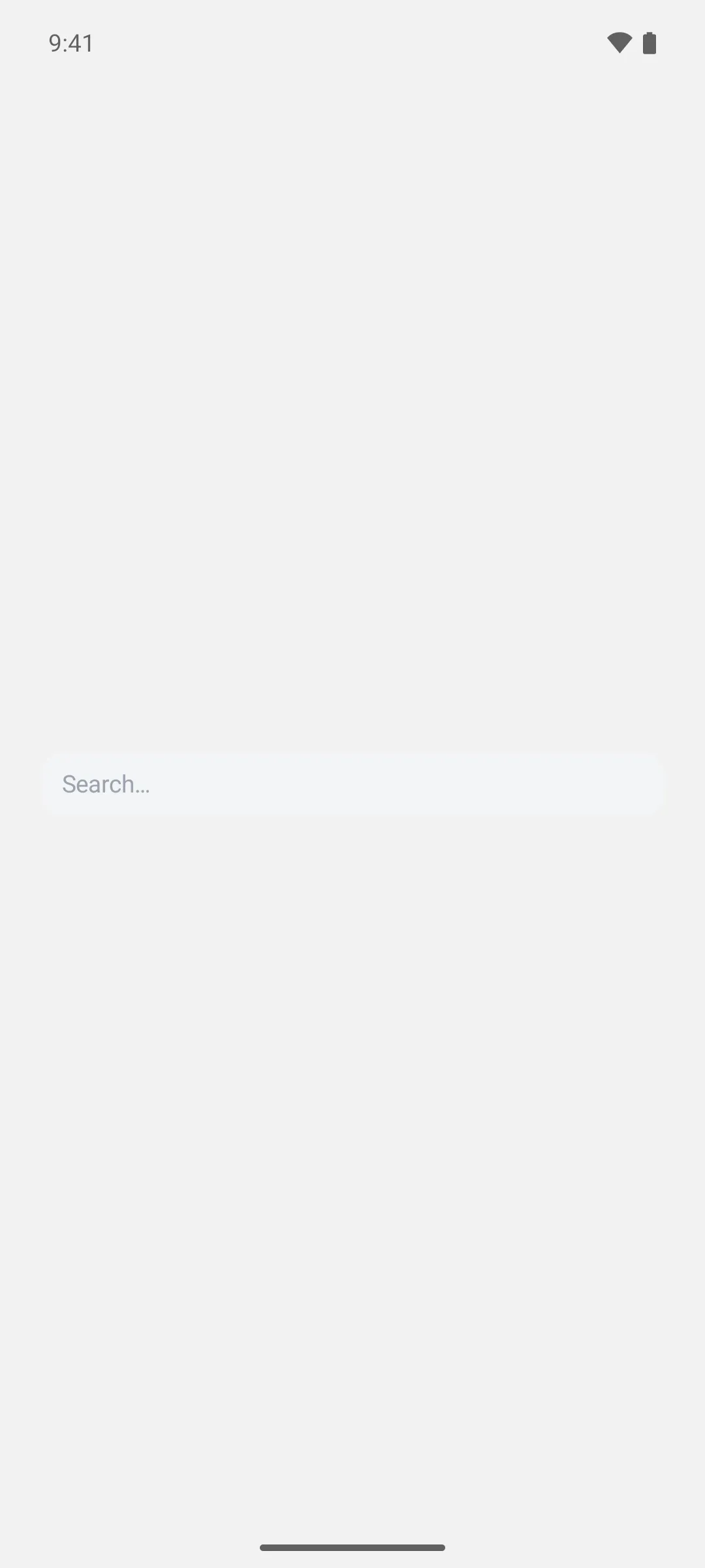 An unstyled text field drawn as a full-width rounded grey pill with a Search placeholder