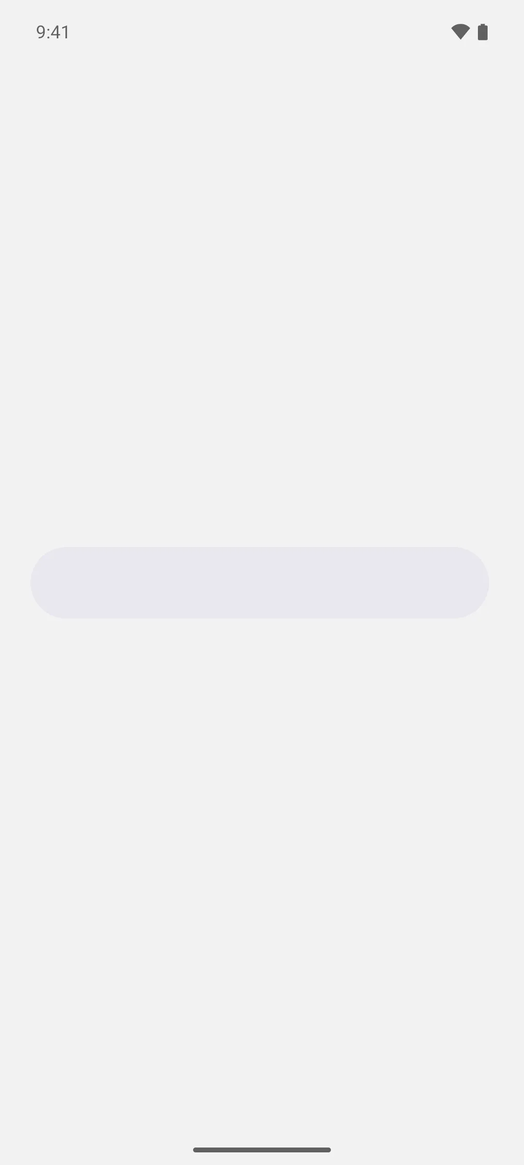 An empty rounded search field with no placeholder text and no icon